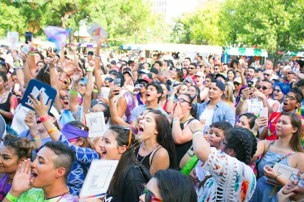 Festival goers cheered on performers at last year's Pride Bigger Than Texas Festival in Crockett Park. - JULIAN LEDEZMA