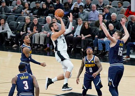 Spur Marco Belinelli drives through the Denver defense. - INSTAGRAM / SPURS