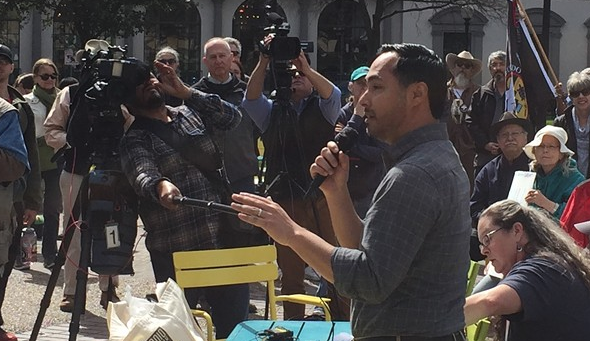Newly bearded Joaquin Castro speaks to a crowd at a recent immigration rally in San Antonio. - SANFORD NOWLIN