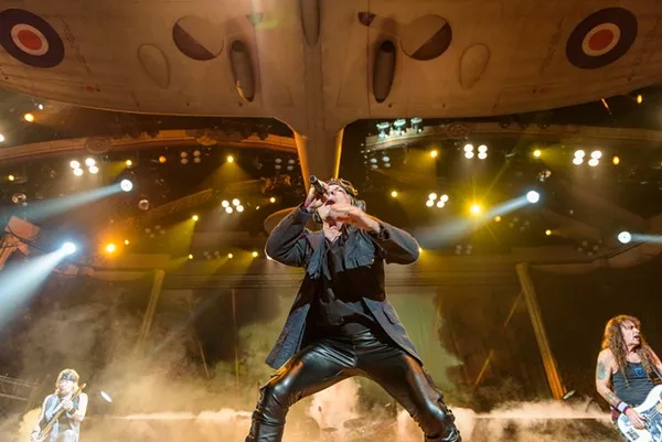 Bruce Dickinson and crew open their set at AT&T Center on Wednesday night with a replica of a British Spitfire overhead. - JAIME MONZON