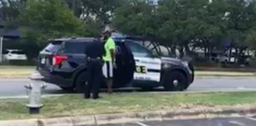 Cell phone footage shows SAPD officers detaining Mathias Ometu. - FACEBOOK / VICTOR MAAS
