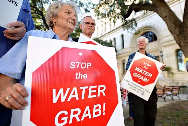 Protesters have issue with SAWS plans to raise rates and lack of transparency. - CHARLIE PEARCE/SIERRA CLUB