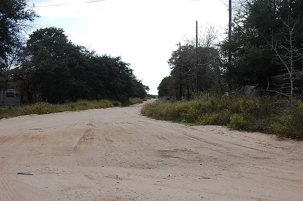 The Bexar County Commissioners Court will look into paving roads like this one. - MICHAEL MARKS