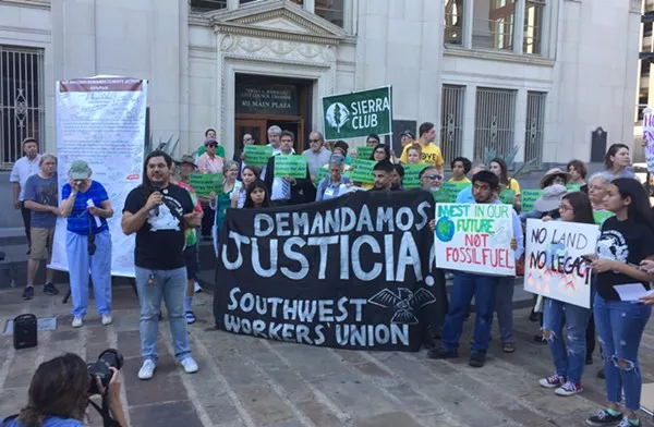 Climate activists, including members of the Sierra Club, rally in front of City Hall in 2019. - SANFORD NOWLIN