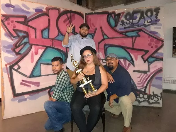Puro chiflason: the team with their Group Piece Finals trophy