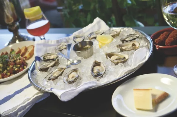 Copper Common's fresh-shucked oysters - JOHN TAYLOR