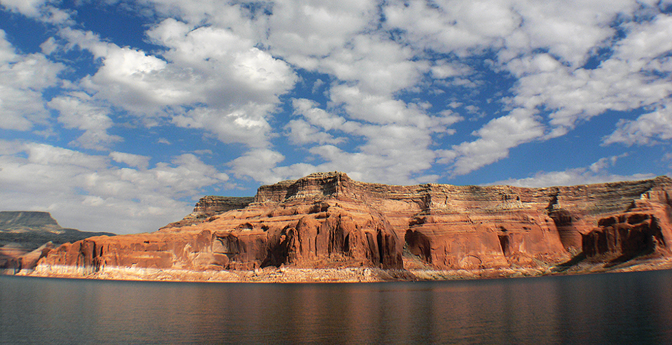 The state is seeking $1.9 billion in damages—the amount the Utah attorney general believes it would cost to locate and remove the metals, thought to be buried in the sediment beneath Lake Powell. - BERNARD SPRAGG VIA WIKIMEDIA COMMONS