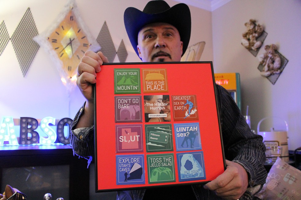 Michael Sanders shows off a display that's now part of his personal collection on Friday, Jan. 17. Following the headline-making frenzy he dubbed "condomgate," the HIV advocate and educator's line has been clogged with requests for the coveted condoms. - ENRIQUE LIMÓN
