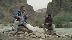 Hasan Majuni and Amin Simiar in Hit the Road - KINO LORBER FILMS