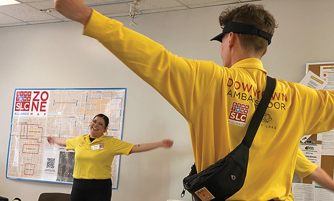 Ambassadors do a warm-up routine before walking the city. - BENJAMIN WOOD