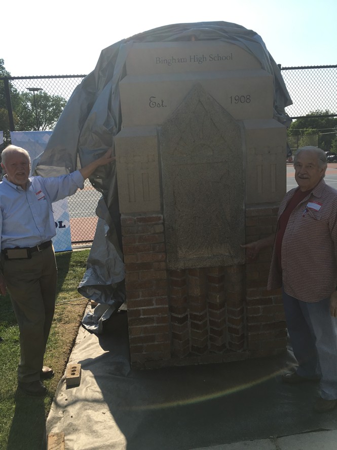 Maynard John Berg and Bill Nicholls unveil the memorial to their beloved Bingham High.