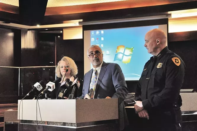 Biskupski and Brown flanking District Attorney Sim Gill at a January 2016 press conference. - COLBY FRAZIER