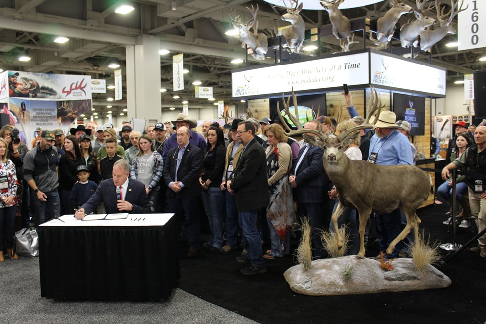 Zinke signs Secretarial Order No. 3362 during the Western Hunting & Conservation Expo at the Salt Palace on Friday, Feb. 9. - ENRIQUE LIMÓN