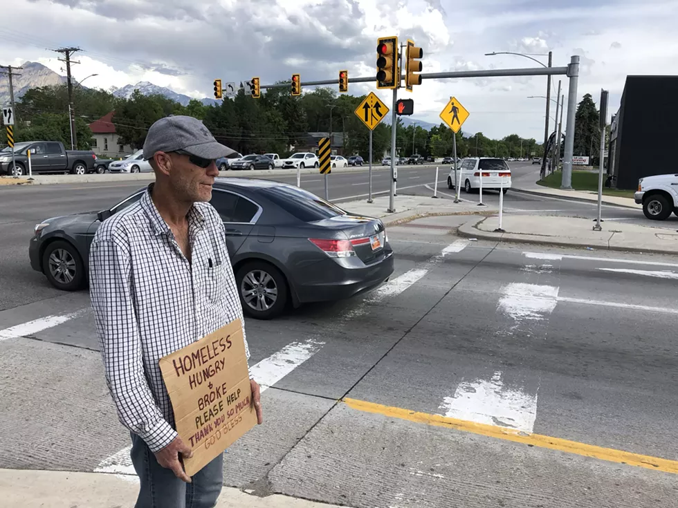 As he stands with his sign on 700 East, Martin says he understands the new laws regarding roadside panhandling and tries to stay out of trouble. - KELAN LYONS