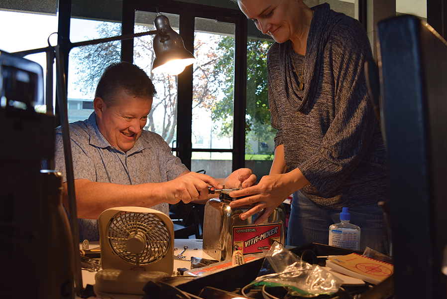 “I’m just happily following along as his apprentice,” Megan Bracken says of fellow Fix-It Clinic coach Dustin Caldwell. - RAY HOWZE