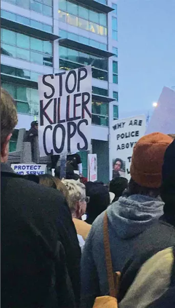Protestors took to the streets on Feb. 29 to denounce the officer-involved shooting. - NICOLE ENRIGHT