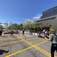 Salt Lake City Mayor Erin Mendenhall and City Councilmember Ana Valdemoros play badminton at the launch of the Green Loop demonstration project on 200 East on Monday, May 1.