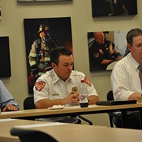 Former UFA Chief Michael Jensen (center) at a July 19 closed-session meeting.