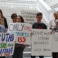 Protesters gathered on Friday to lend their voice in opposition of HB155.