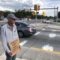 As he stands with his sign on 700 East, Martin says he understands the new laws regarding roadside panhandling and tries to stay out of trouble.