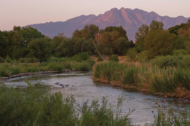 Years of work on the Jordan River, shown here between Murray and Taylorsville near Germania Park, have boosted the river’s appeal to recreationalists and developers. - JORDAN ALLRED