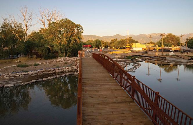 The new Three Creeks Confluence bridge spans the Jordan River in Salt Lake City near 1300 South - JORDAN ALLRED