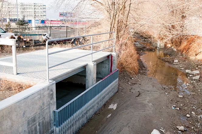 The water-diversion box Salt Lake County installed on the canal bank. - NIKI CHAN
