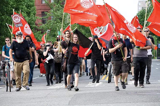 Industrial Workers of the World supporters march for J20 defendants on May Day in Washington, D.C. - BAYNARD WOODS