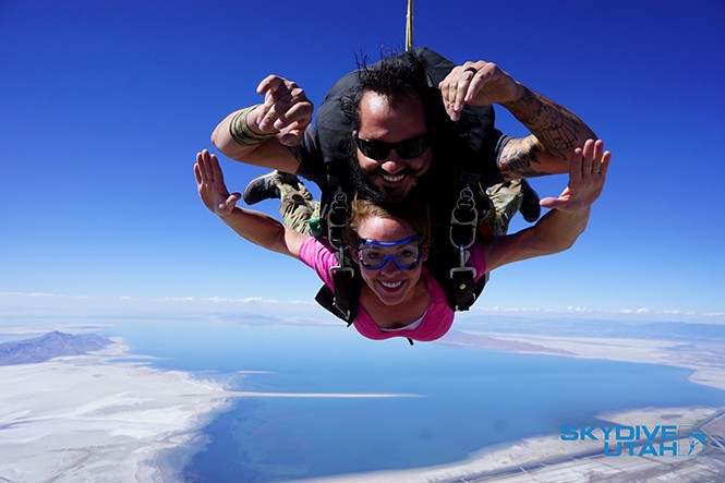 Mike Chapman and a Skydive Utah client in midair. - MATT HOCKMAN