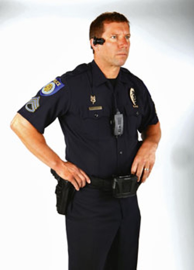 A police officer wearing an AXON Video Recorder