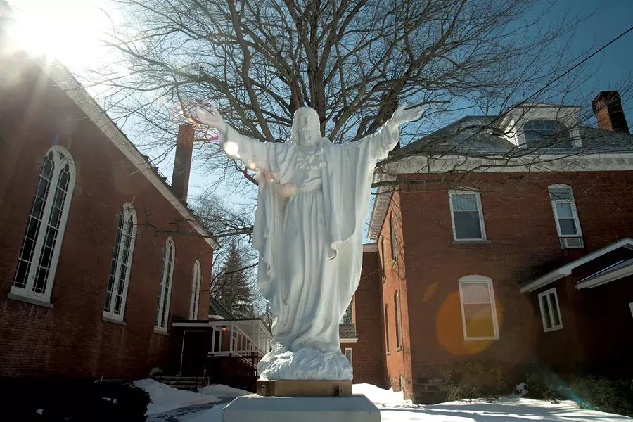 A statue of Jesus - between St. Anthony’s - rectory and parish hall