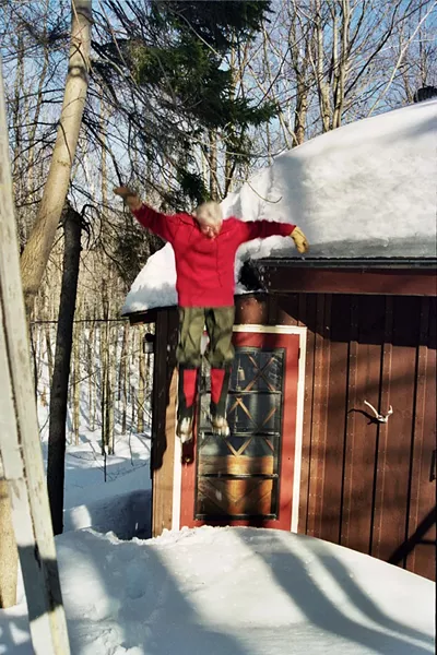 Anne Mausolff jumping off the roof of her house - COURTESY OF SHANTI BRUBAKER