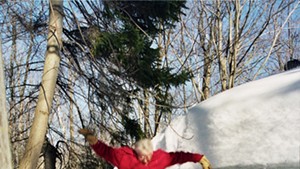 Anne Mausolff  jumping off the roof of her house