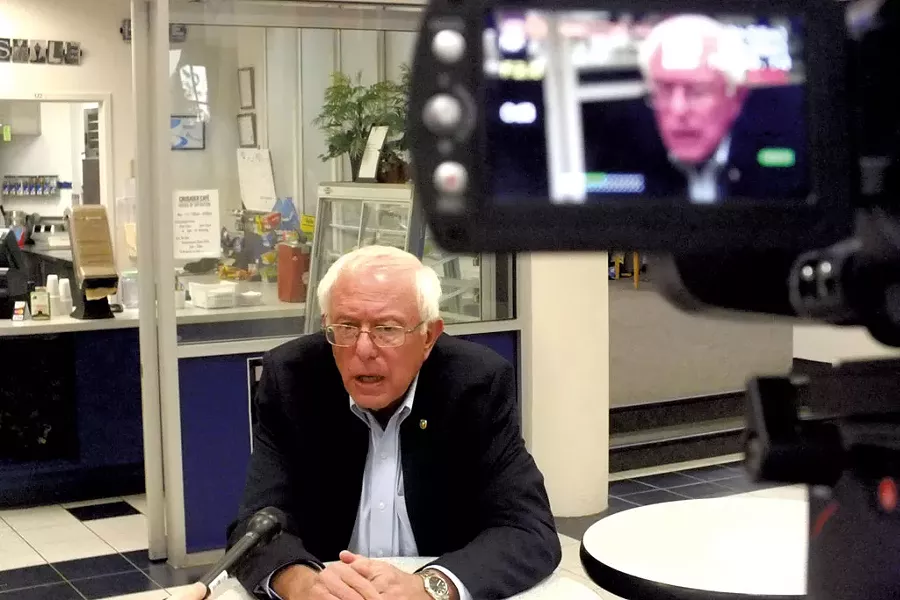 CNN interviews Sanders at a town hall meeting in Dubuque, Iowa - ADAM BURKE