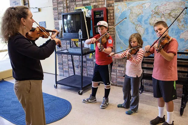 Fran Taylor with students Parker Ballard, Elizabeth Crawford and Milo Barron