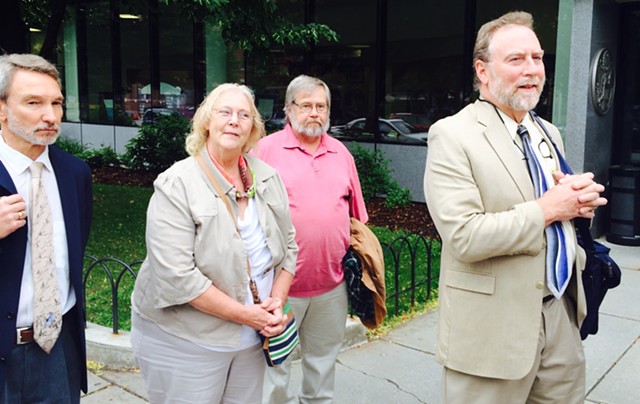 From left, Allen Gilbert, director of the Vermont chapter of the ACLU; Rhonda Taylor, her husband, Ken Taylor and attorney Robert Appel announce outside U.S. District Court in Burlington the filing of a  wrongful death lawsuit against the Vermont State Police for the 2012 death of Rhonda Taylor's son, MacAdam Mason. - MARK DAVIS