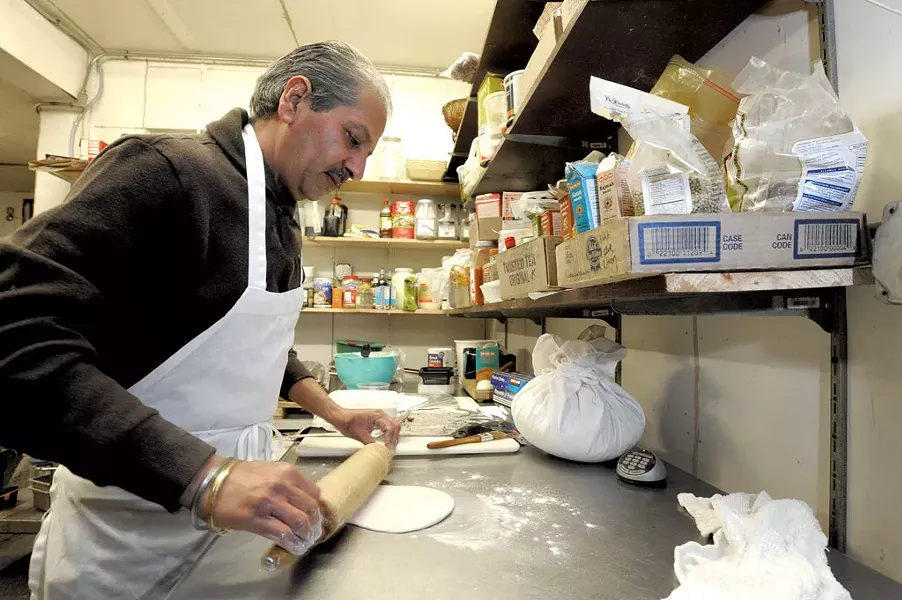 Gary Singh rolls out naan - JEB WALLACE-BRODEUR
