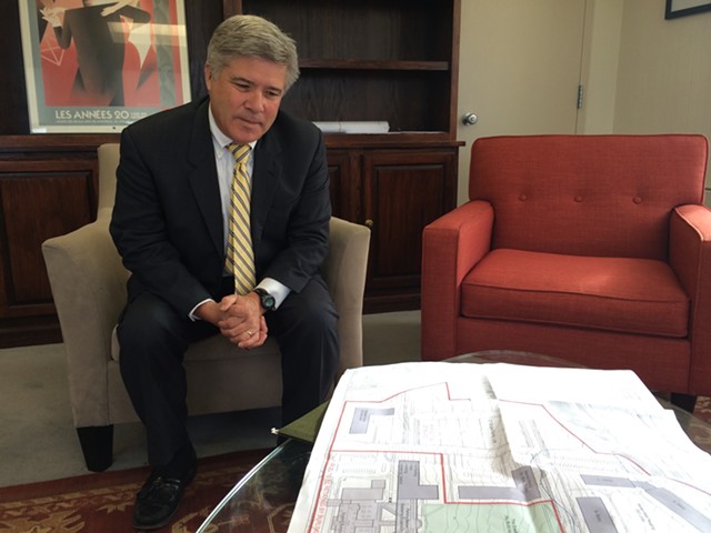 Interim president Mike Smith reviews the development plans for the Burlington College property. - ALICIA FREESE