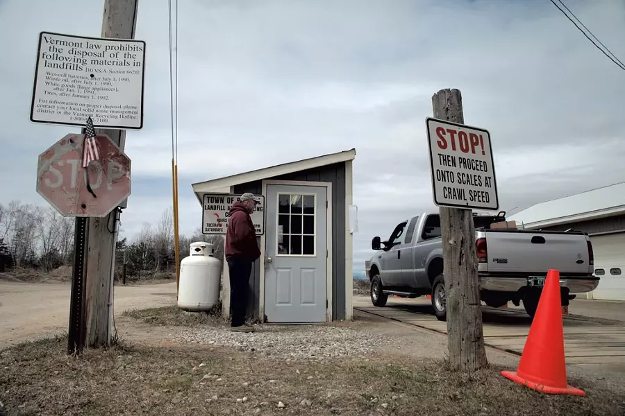 Landfill manager Merle Knight looking - on as a truck is weighed at the scale shed - MATTHEW THORSEN