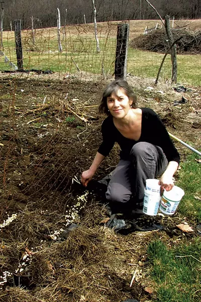 Maggie planting peas in her garden - COURTESY OF EVE FOX