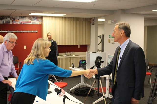 Nancy Remsen shakes Gov. Peter Shumlin's hand last month before the Burlington Free Press' gubernatorial debate. - PAUL HEINTZ