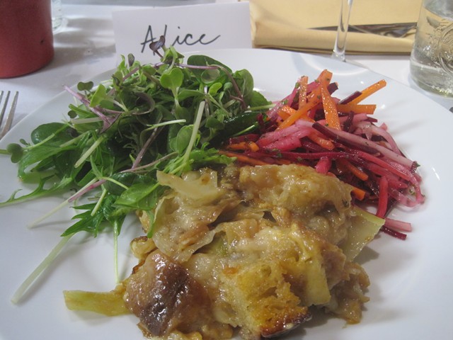 Onion confit, cabbage and cheddar panade in the style of Zuni Café's Judy Rodgers. Served with root veggie slaw and the season's first spring greens
