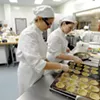 Rachel Kalinowski, left, and Lauren Layman fill savory mini quiches at NECI in Montpelier Rachel Kalinowski, left, and Lauren Layman fill savory mini quiches at NECI in Montpelier