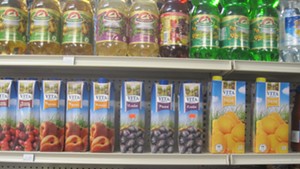 Russian sodas, juices and canned fish stock the shelves at Neighborhood Market