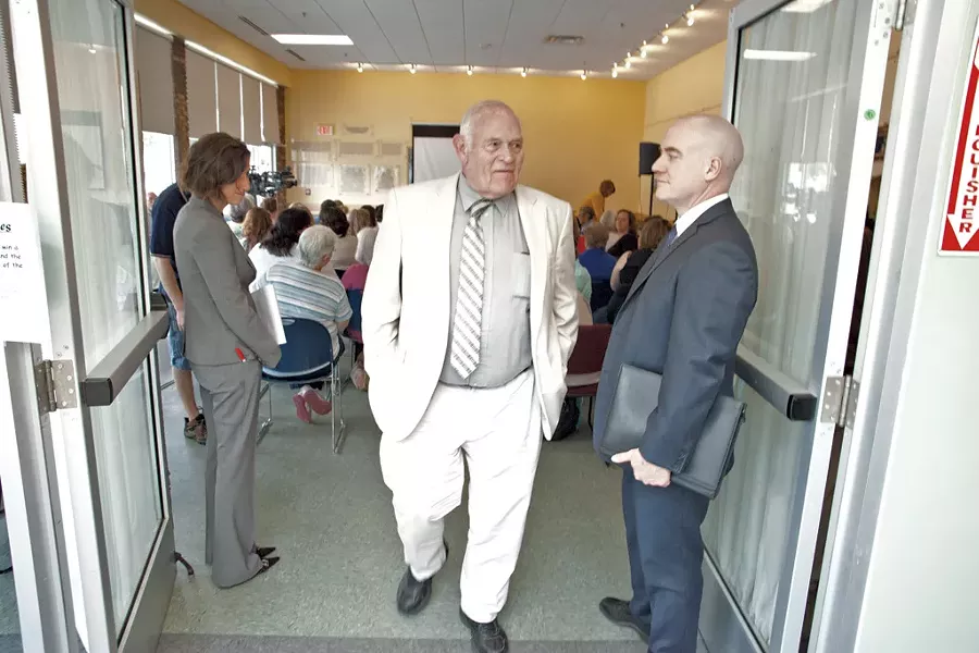 Sears leaves a DCF public meeting in Winooski - MATTHEW THORSEN