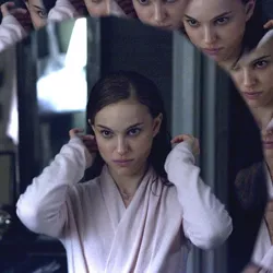 SPLITTING IMAGE Portman finds herself literally cracking up in Aronofsky’s ballet thriller.