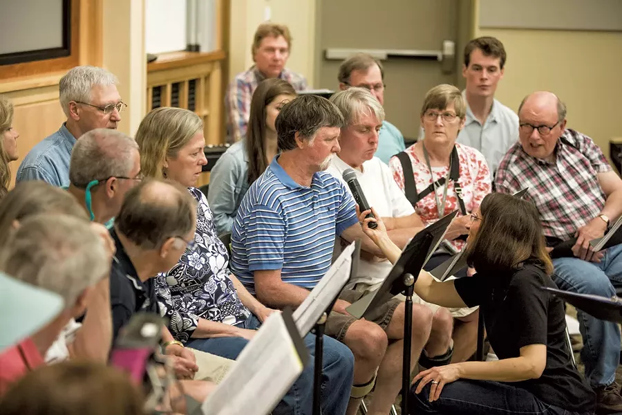 Stroke survivor Bob Smith speaks during a dress rehearsal of the Aphasia Choir - OLIVER PARINI