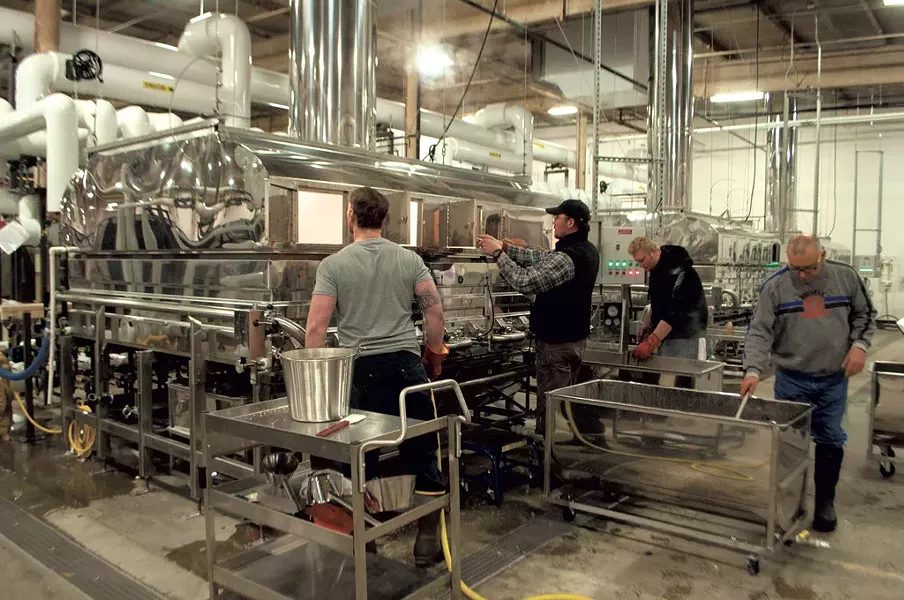 Sweet Tree workers in front of the evaporator - HANNAH PALMER EGAN