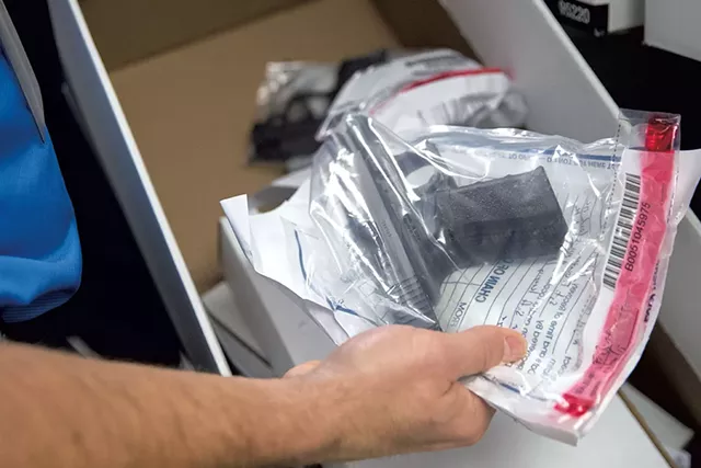 A gun stored in the critical evidence locker at the Colchester Police Department - JAMES BUCK