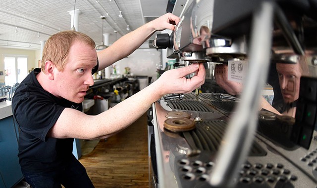 Ben Colley working on an Italian espresso machine at Down Home Kitchen in Montpelier - JEB WALLACE-BRODEUR